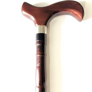 Wooden cane with small imperfections around handle (E)